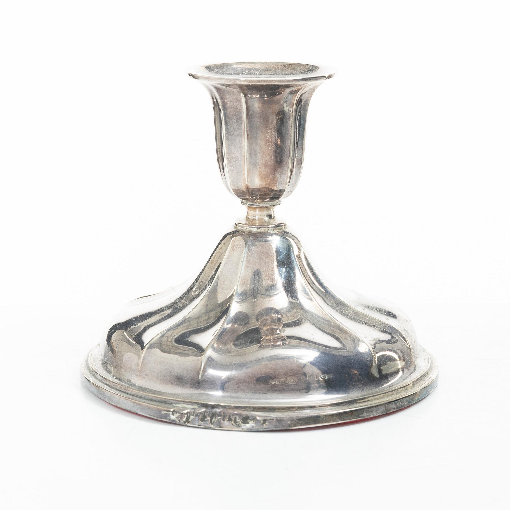 Three silver candlesticka, Norway, 20th century.
