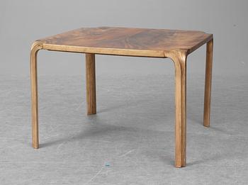 An Alvar Aalto mahogany and stained beech "Fan-leg table" by Artek, Finland.