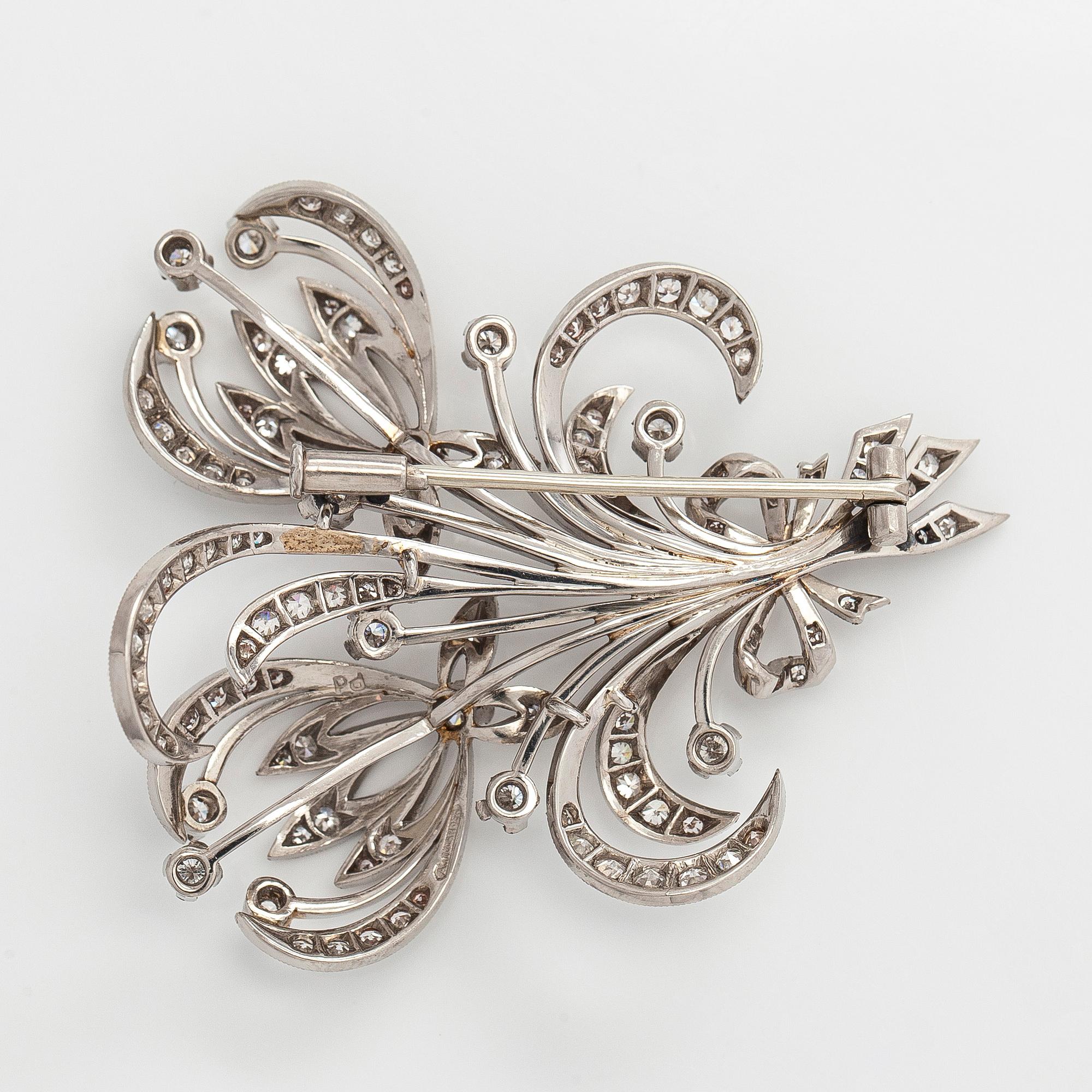 A. Tillander, Brosch, palladium med briljant- och åttkantslipade diamanter. Helsingfors.