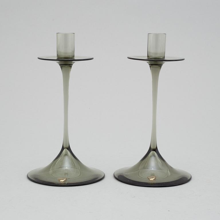 NILS LANDBERG, a pair of glass candlesticks, Orrefors.