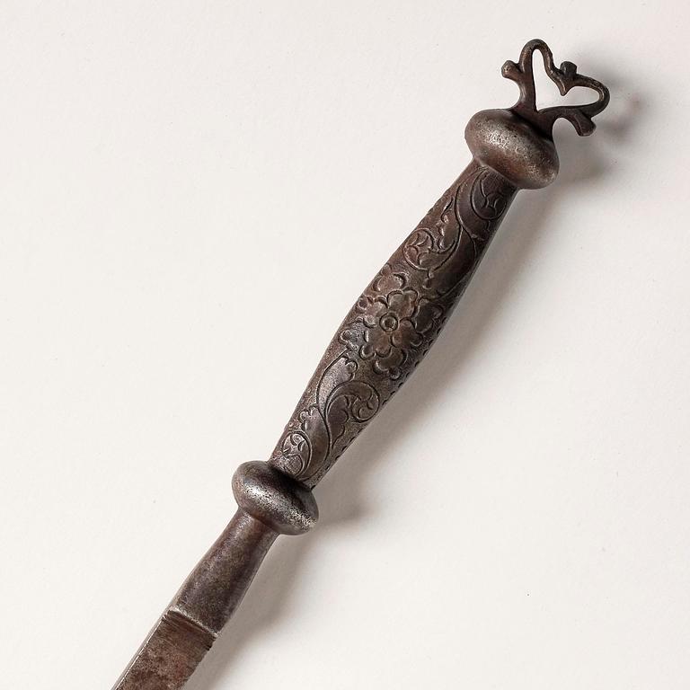 An engraved iron measuring stick from Wira iron manufactory, dated 1717.