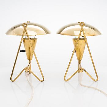 Two mid-20th-century wall lights / table lamps, model EV 57 for Itsu, Finland.