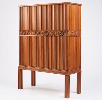 A Swedish Modern stained pine cabinet, 1940s.