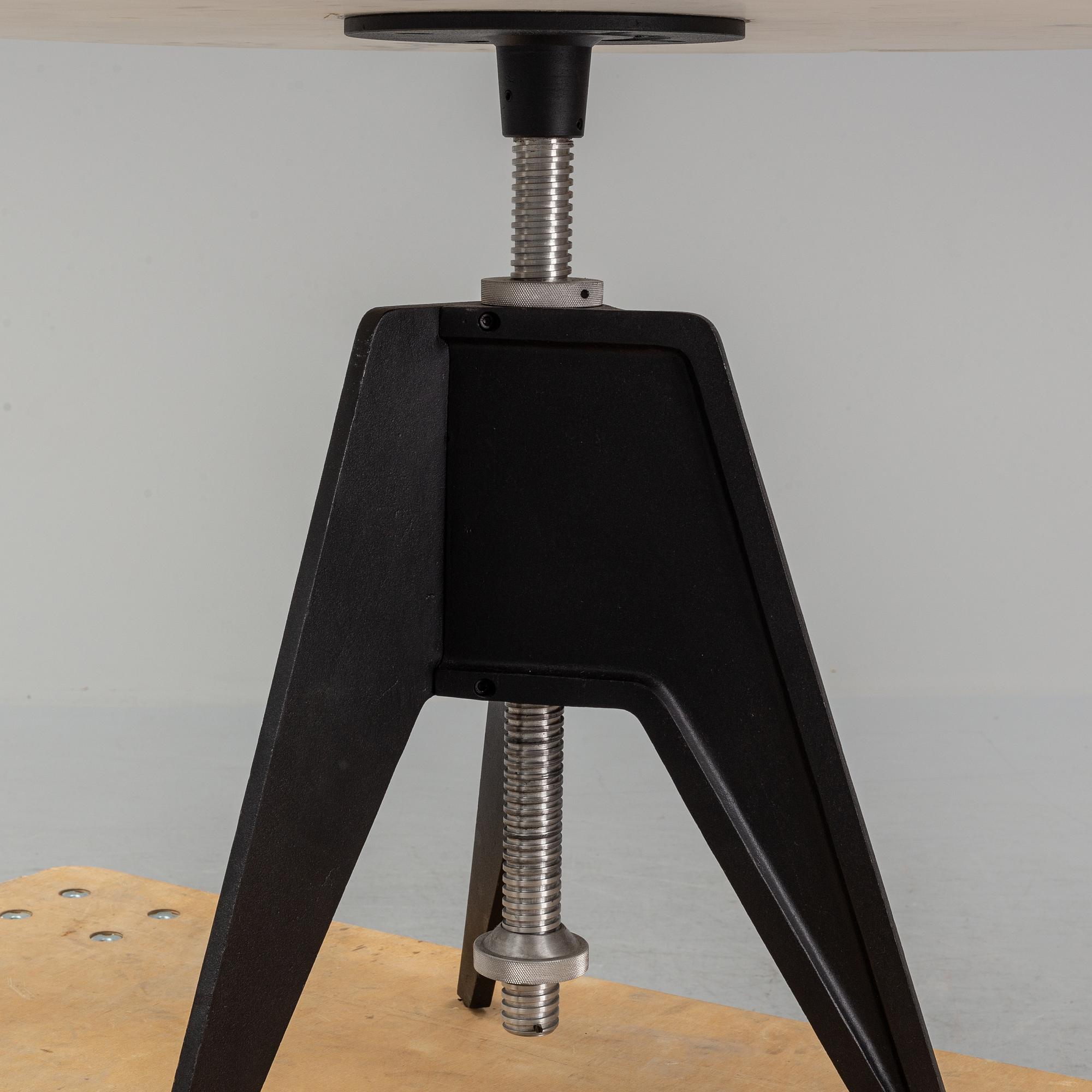 A Tom Dixon Screw Café Table.