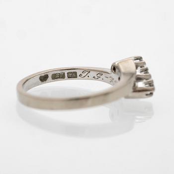 18K white gold ring with diamonds.