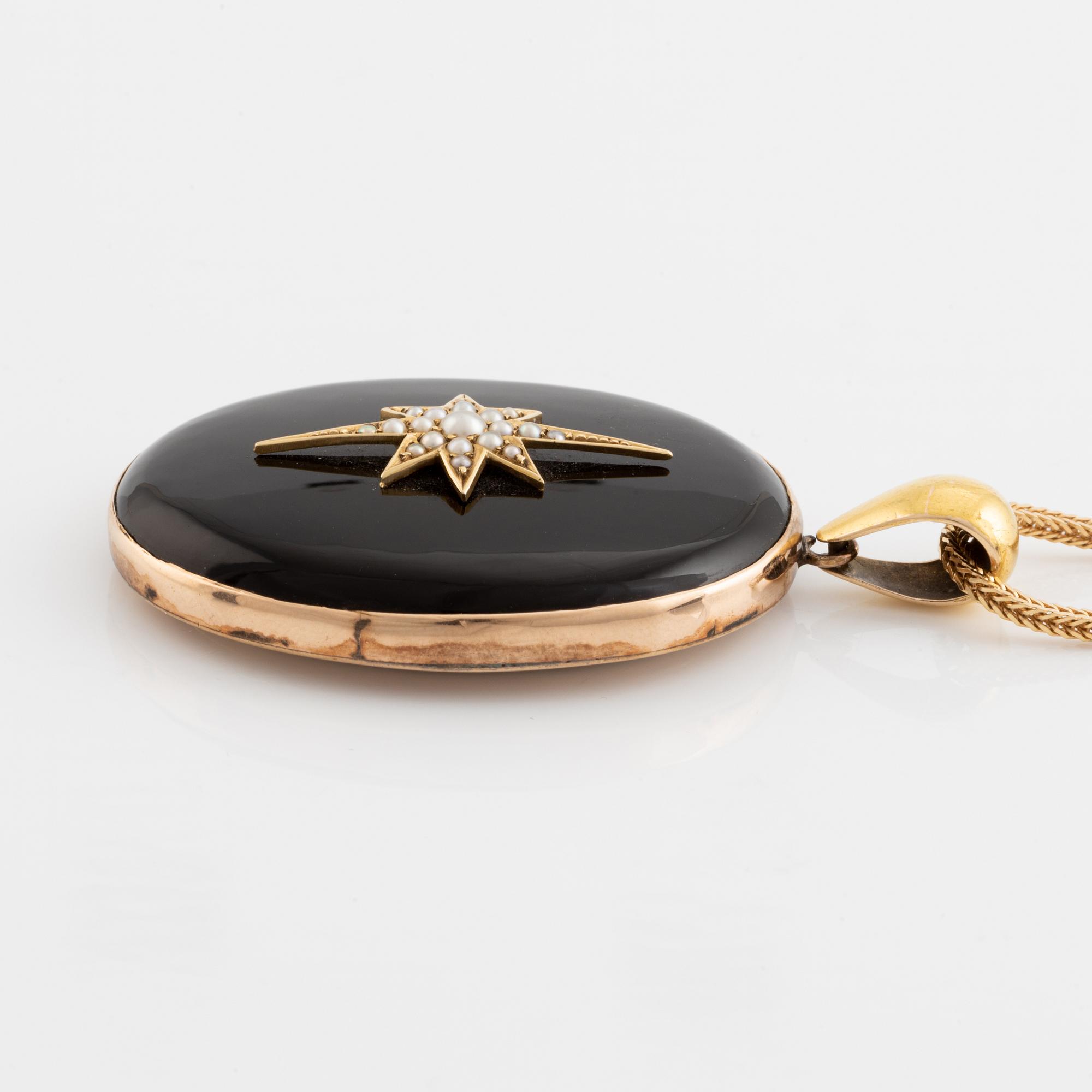 Black stone and seed pearls locket, with chain.