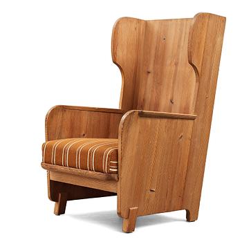 Axel Einar Hjorth, a "Lovö" stained pine armchair, Nordiska Kompaniet, Sweden, 1930's.