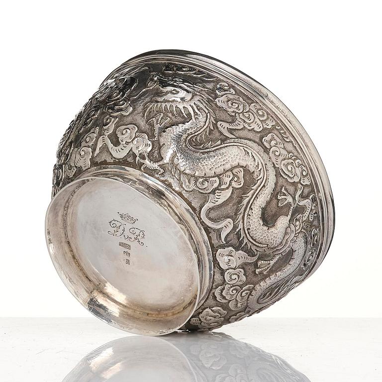 A Chinese Export silver 'dragon' bowl, late 19th century. The base with the monogram D v R beneath a noble coronet.