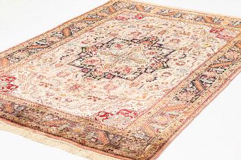 A rug, old, silk Tabriz, signed, ca 201 x 140 cm.