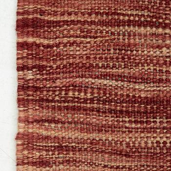 A kilim carpet, 304 x 203 cm.