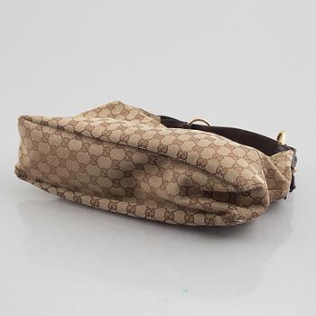 Gucci, a handbag.