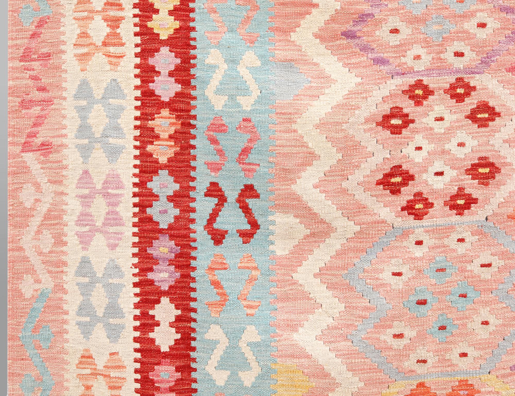 A Kelim carpet, c. 343 x 256 cm.