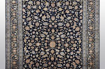 A carpet, Kashan, ca 416 x 304 cm.