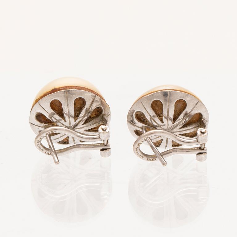 A pair of 18K white gold earrings set with Mabe pearls, Hans Strömdahl Stockholm 1989.