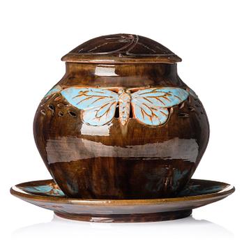 81. Hilma Persson-Hjelm, a glazed earthenware art nouveau lidded tureen with a plate, executed i her studio, Arvika 1919. No 8812,  plate 1699.
