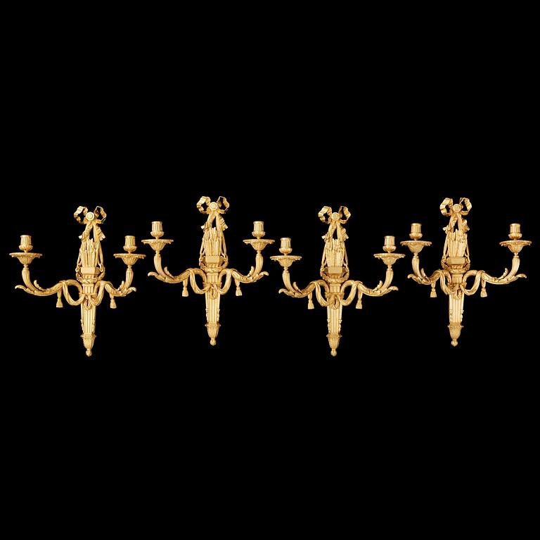 Four Louis XVI-style late 19th century two-light wall-ligts by Victor Paillard (1805-1886).