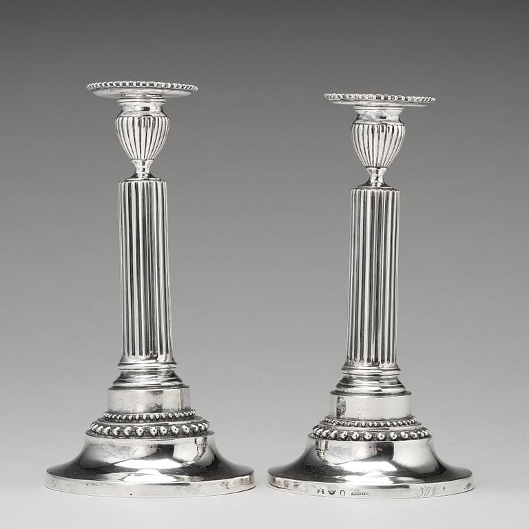 A pair of Swedish Gustavian silver candlesticks, mark of Mikael Nyberg, Stockholm 1788.