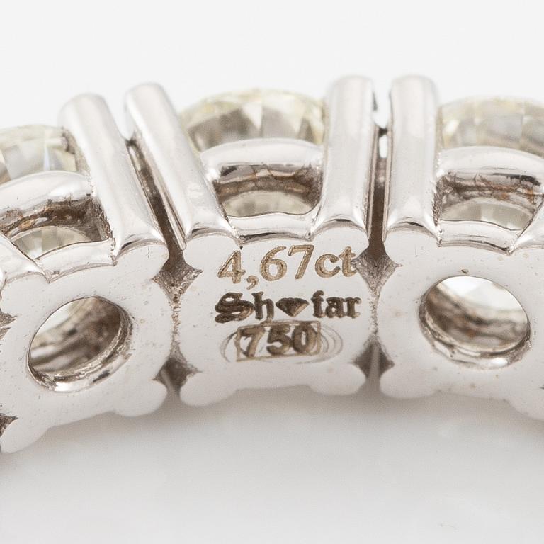 Ring helallians, 18K vitguld med briljantslipade diamanter.