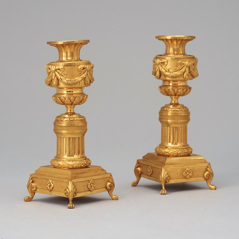 A pair of Louis XVI-style late 19th century candlesticks/cassolettes.