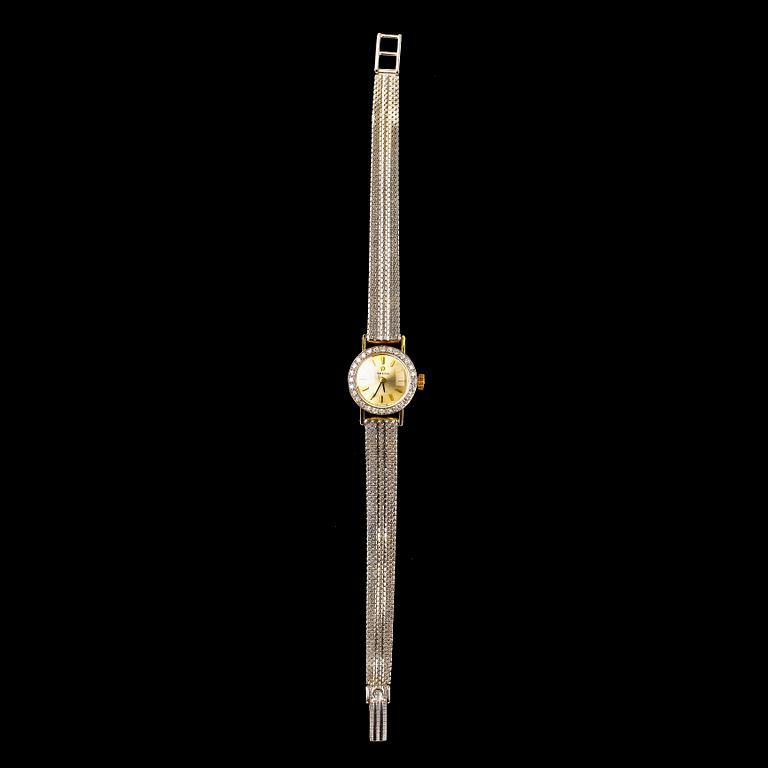 ARMBANDSUR, Omega, 18k guld och vitguld med 28 briljanter, tot 0.24 ct, vikt 27 g.
