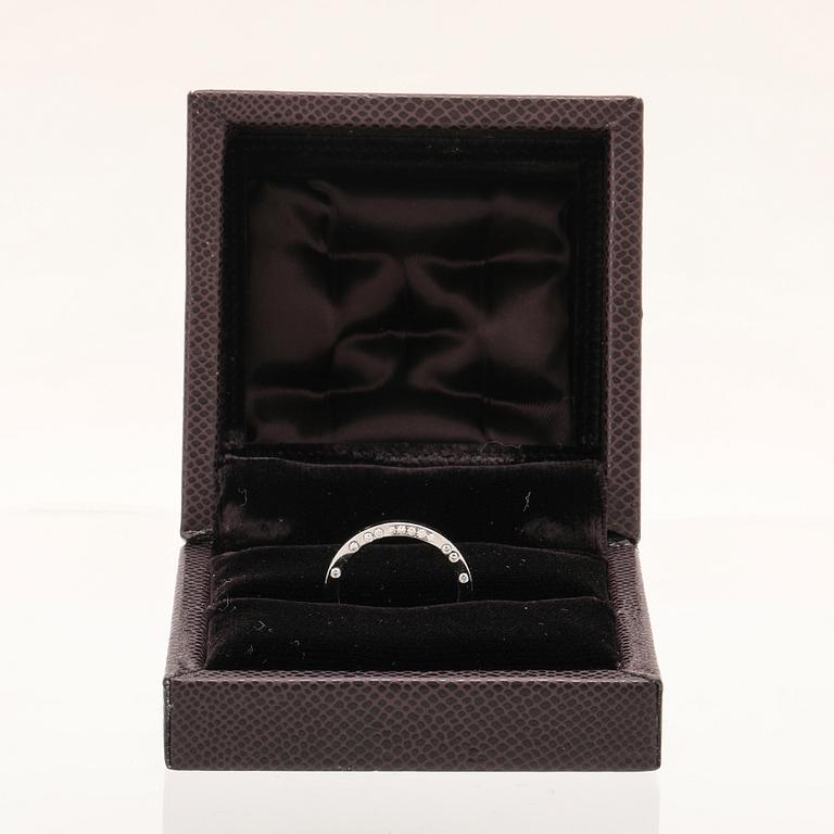 A “Divine Rita” ring 950 platinum and brilliant cut diamonds by Boucheron.
