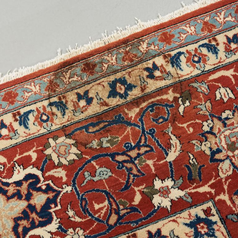 A old Esfahan carpet, around 299 x 210 cm.