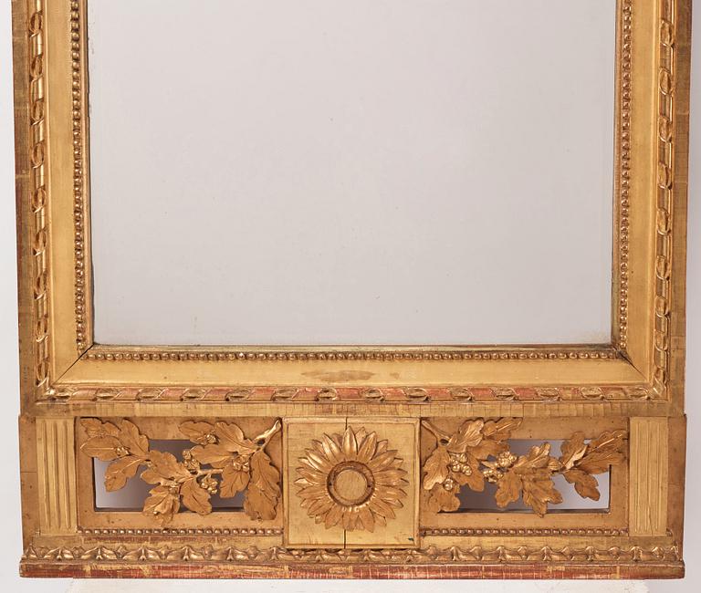 A Gustavian giltwood mirror by C. G. Fyrwald (master in Stockholm 1776-1825).