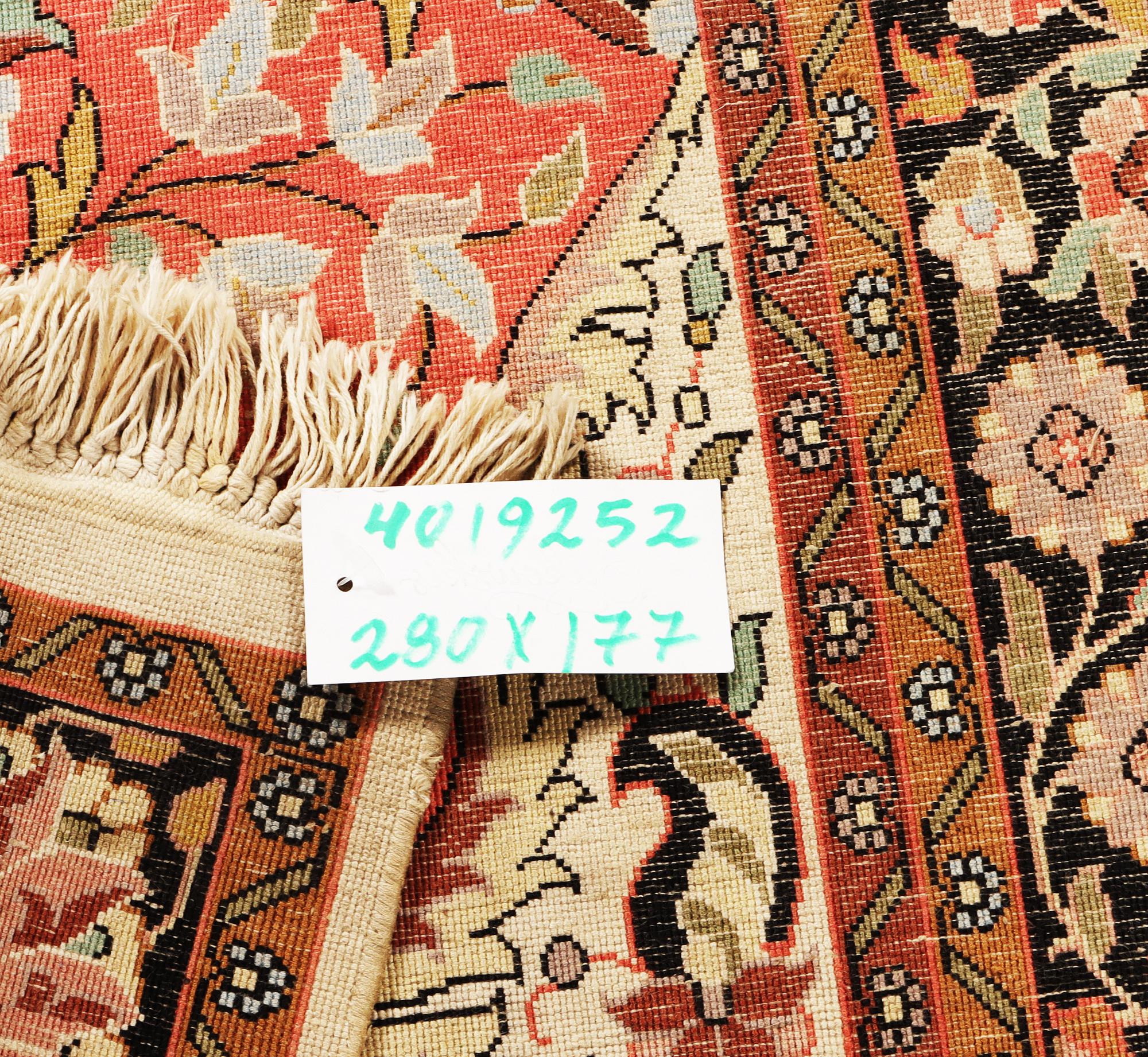 A silk Kashmar carpet, c. 280 x 177 cm.