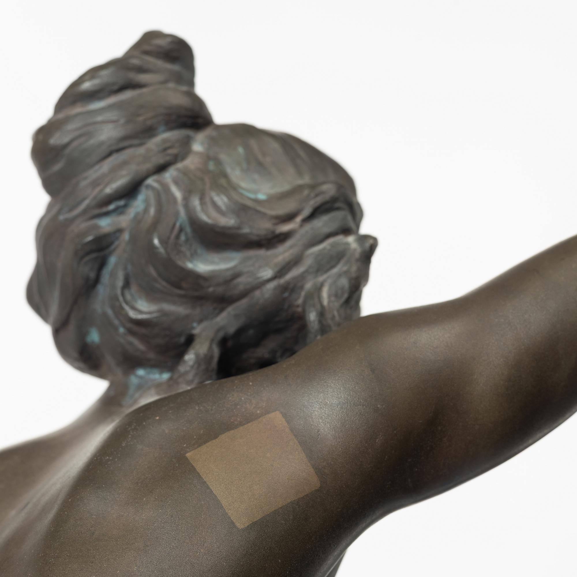 Alice Nordin, seated female figure.