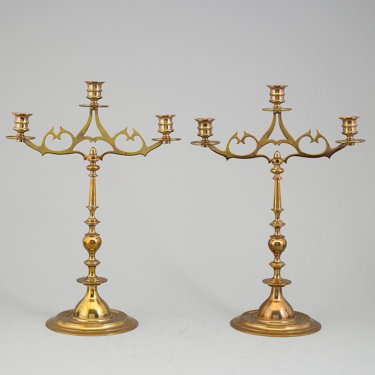 A PAIR OF BRASS CANDELABRA, no 115, EOS, Jönköping, first half of the 20th century.