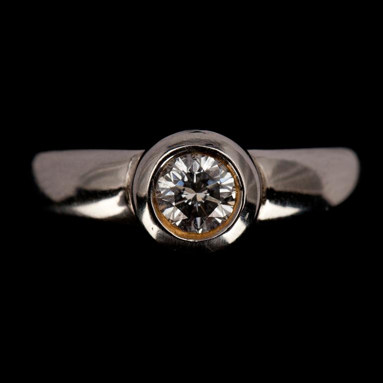 RING, briljantslipad diamant ca 0.30 ct uppskattningsvis W/si. 18K vitguld. Vikt 7,3 g.