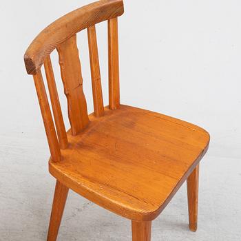 A set of four stained pine chairs from Åby Möbelfabrik, 1940s.