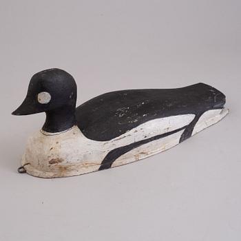 4 painted wooden ducks from the 20th century.