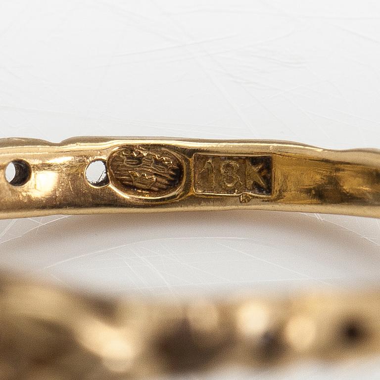 An 18K gold and silver ring with rose cut diamonds ca. 0.57 ct in total. Early 19th century.