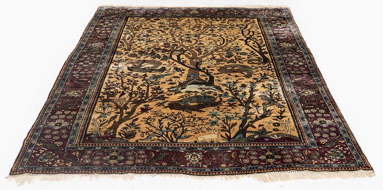 A pictoral silk Kashan 'Mohtasham' rug, c. 195 x 130 cm.