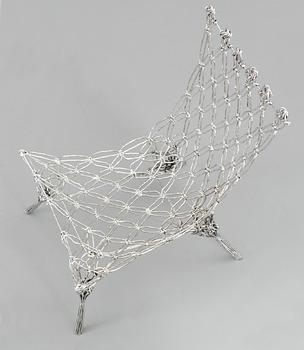 A Marcel Wanders 'Knotted Chair' made of macramé knotted carbon and aramide fiber cord by Cappellini, Italy.