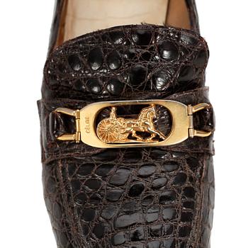 CÉLINE, a pair of brown crocodile shoes and a matching belt.