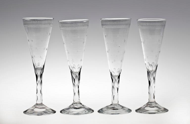 A set of four 19th century champagne glasses.