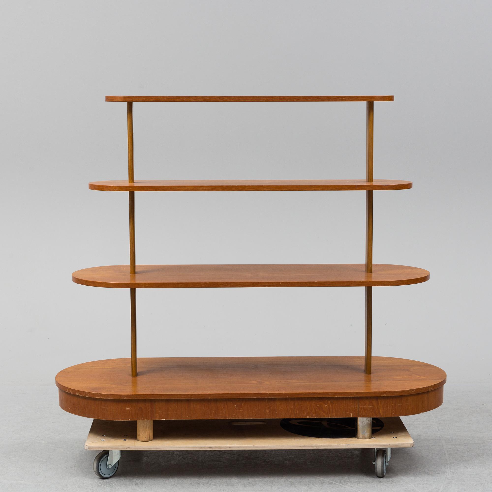A mid Century Modern teak shelf.