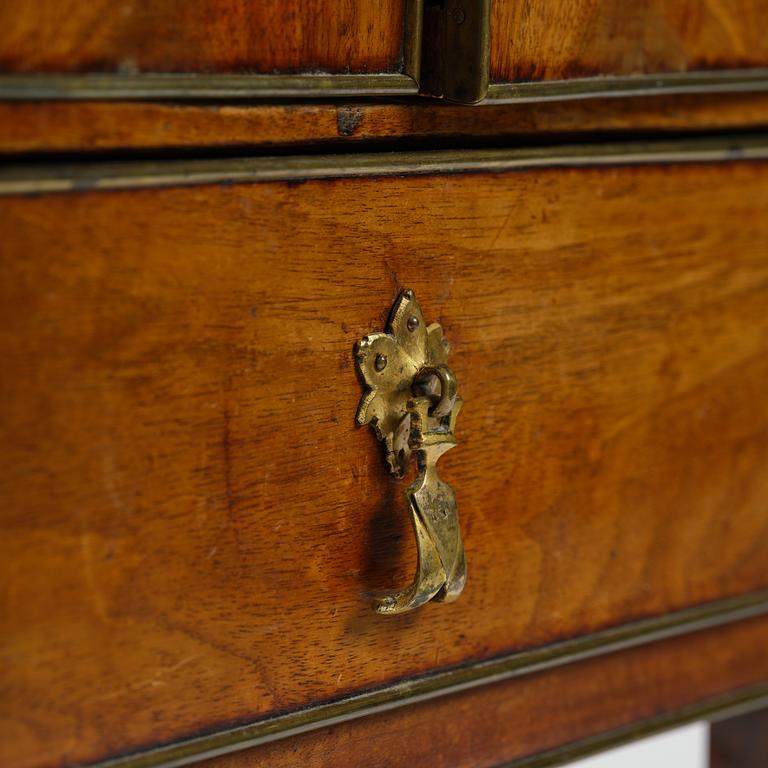 A late Gustavian mahogany chamberpot cupboard, circa 1800.