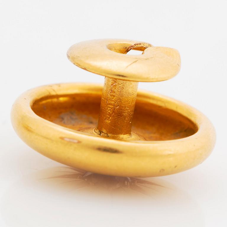 A pair of 18K gold cufflinks set with old-cut diamonds.