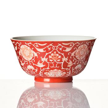 A coral red reverse decorated floral bowl, seal mark of Daoguang, Republic, 20th century.