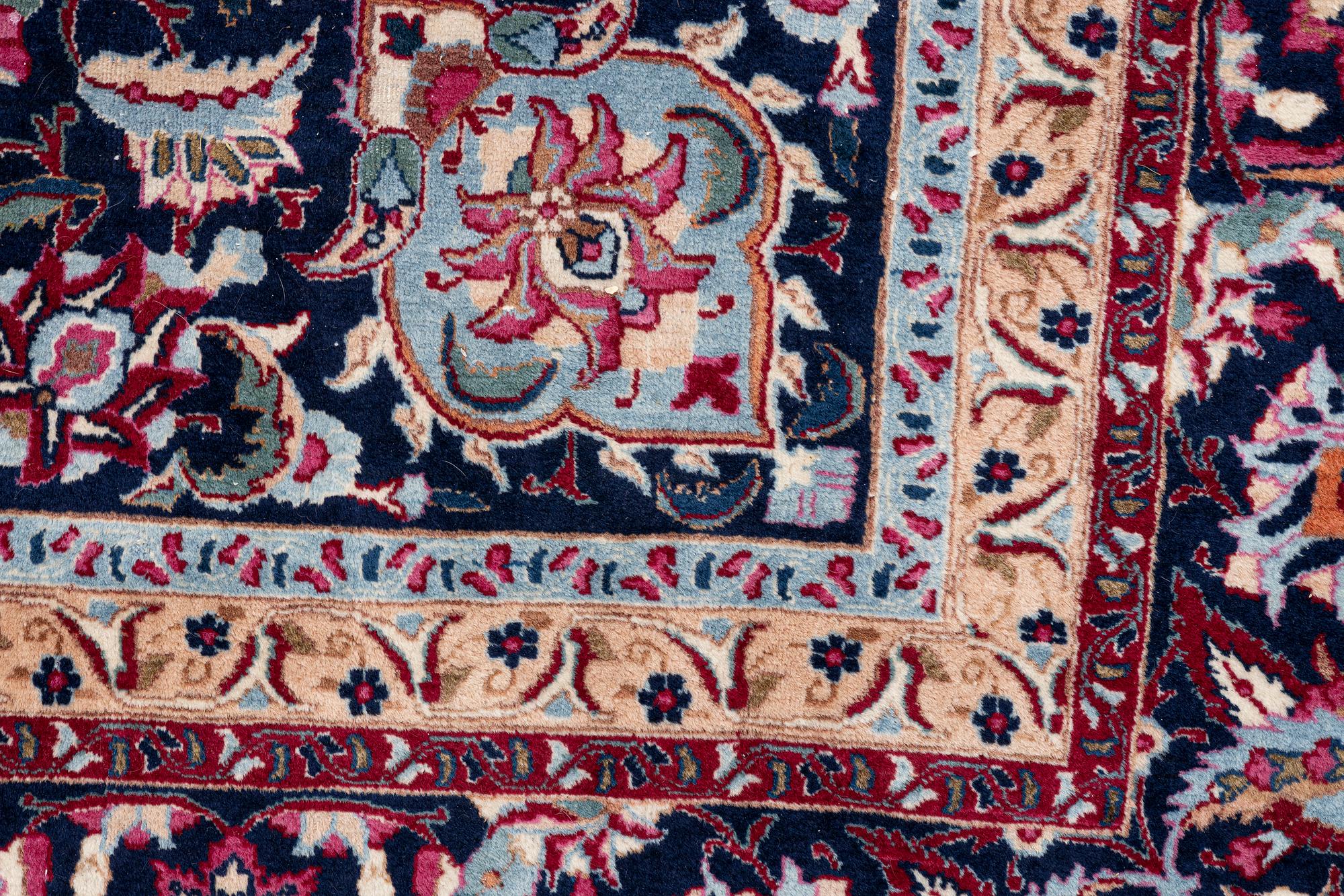 A oriental carpet, c. 375 x 290 cm.