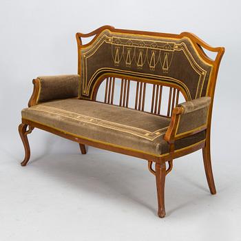 An eight piece Art Nouveau lounge suite in mahogany, Belgium/Netherlands, early 20th century.