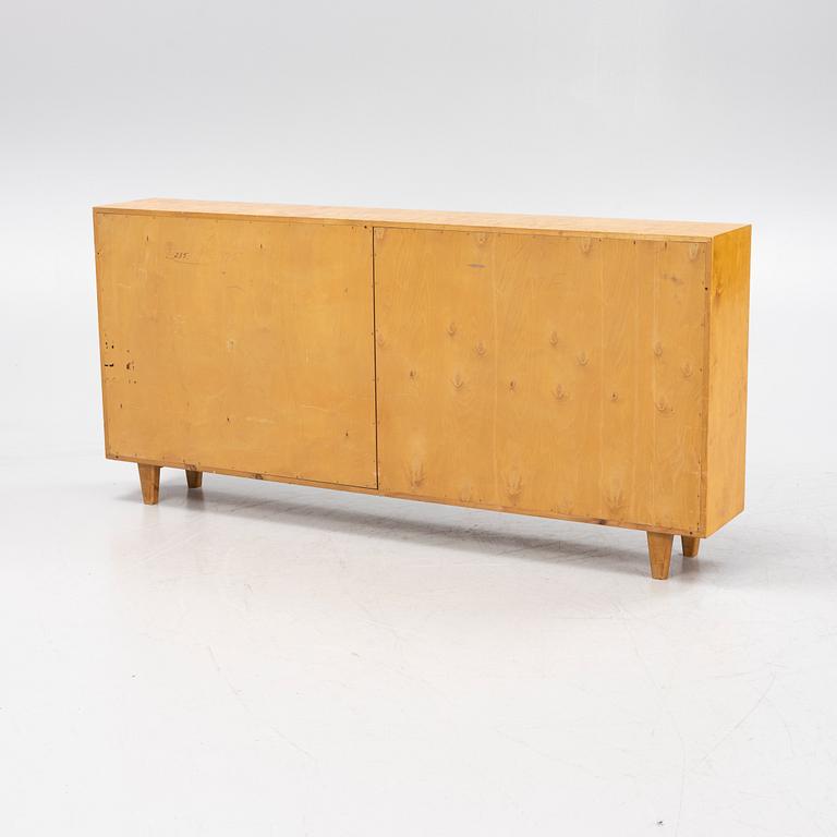 A birch veneered book case. 1940s/50s.