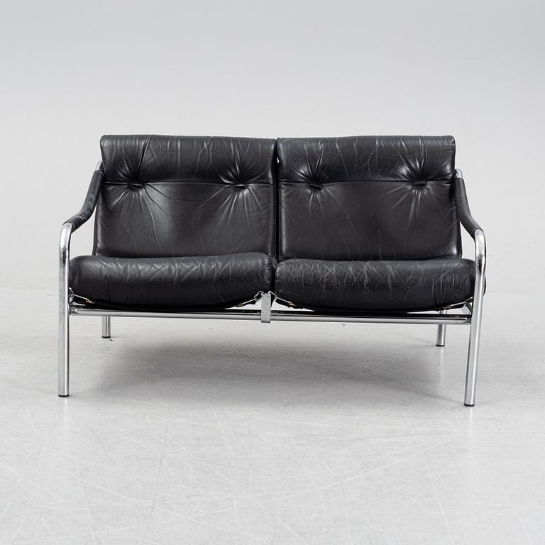 A 1960's leather upholstered 'Kadia' sofa  by Tim Bates for Pieff.