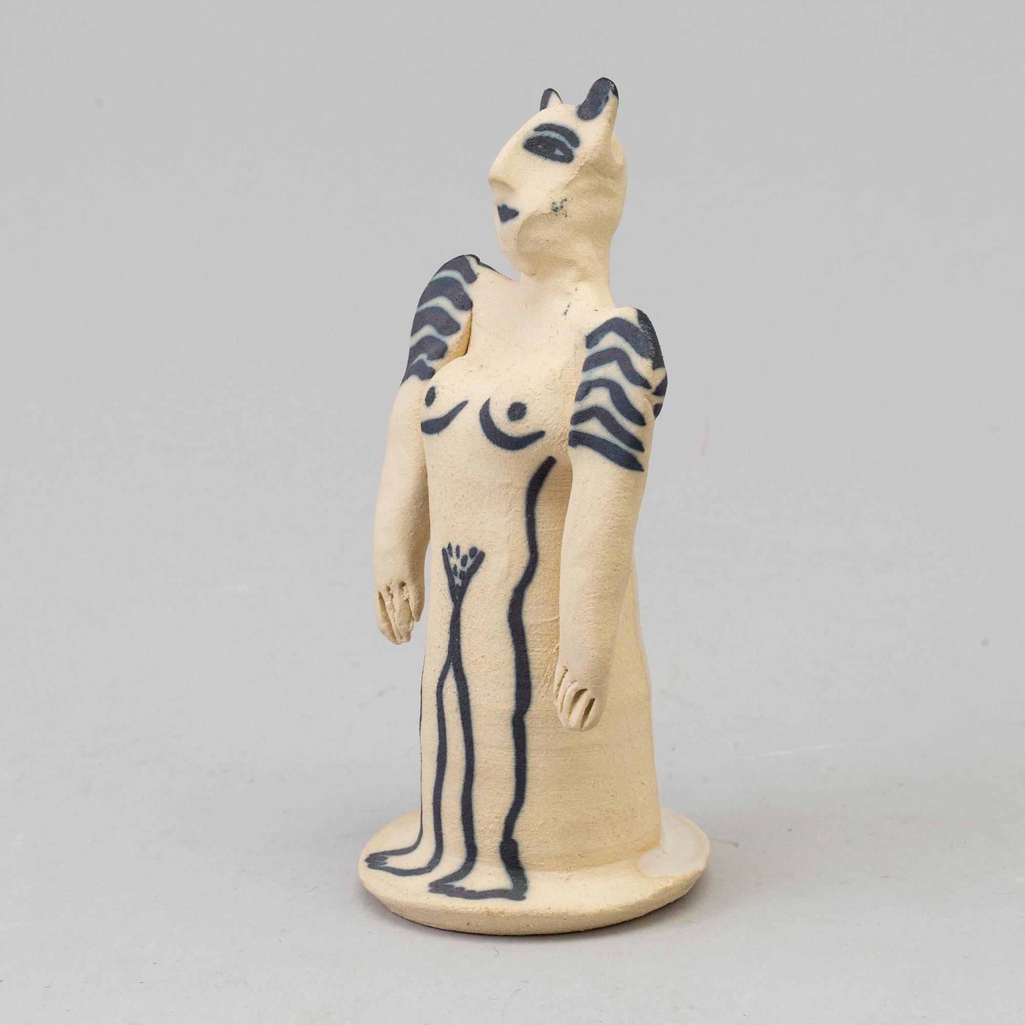 ULRICA HYDMAN-VALLIEN, a stoneware figurine, signed.