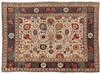 379. A semi-antique Tabriz carpet, Northwest Persia, of Safavid 'Vase' design, c.328 x 242 cm.