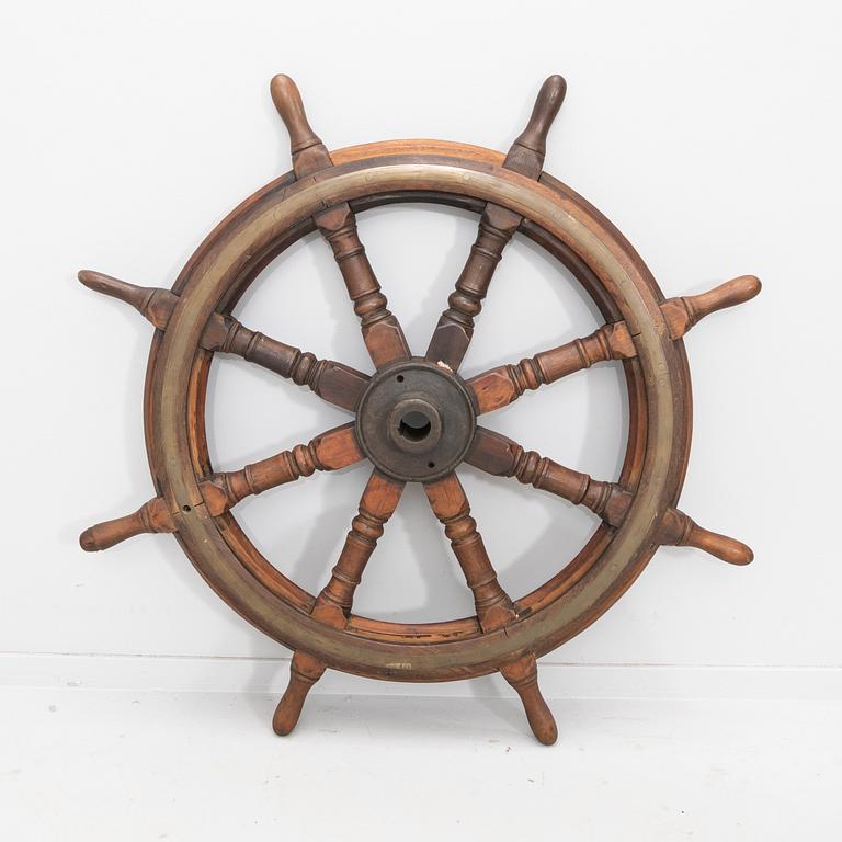 An 19th century ships stering wheel.