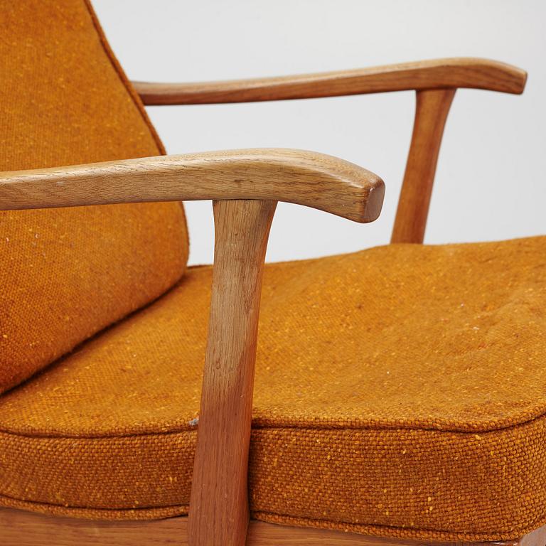 Carl Malmsten, a "Stora Fjäderbrickan" armchair, mid 20th century.